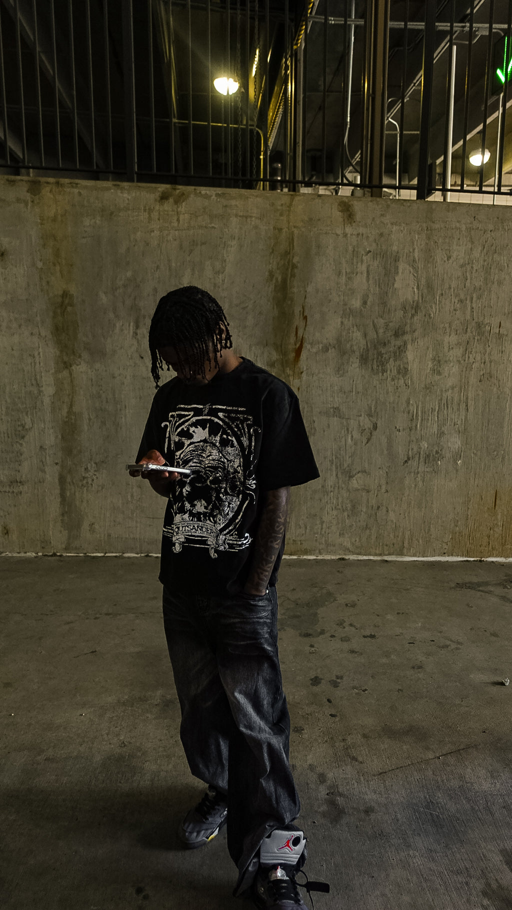 Last One $tanding Black Tee